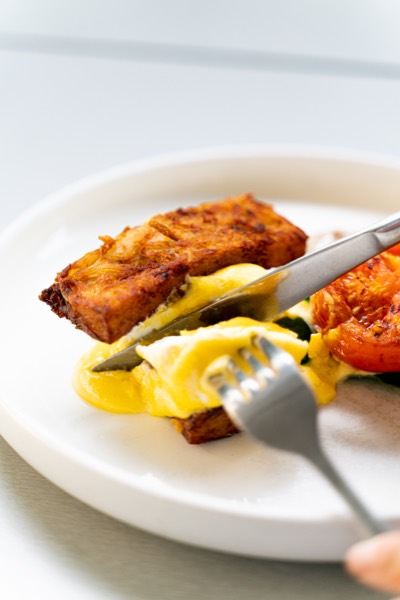 Crumbed schnitzel with hollandaise