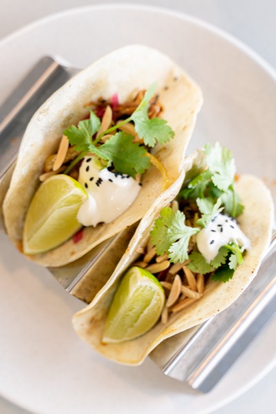 Soft tacos with slaw, coriander and lime