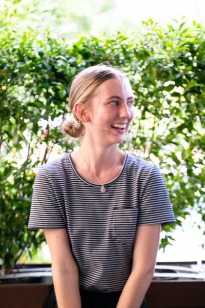 A smiling member of the Toscas team